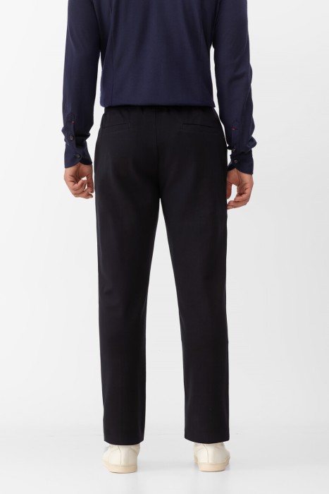 брюки  по цене 53100 руб вид справа