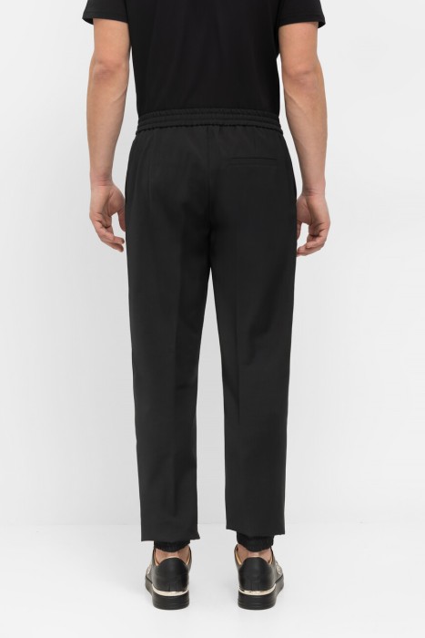 брюки  от бренда philipp plein вид слева