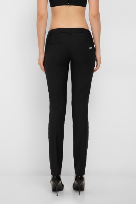 брюки  от бренда philipp plein вид слева