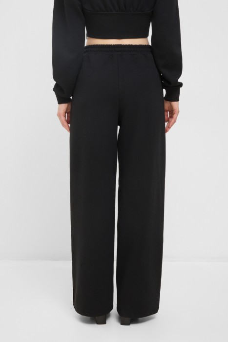 брюки  по цене 29400 руб вид справа