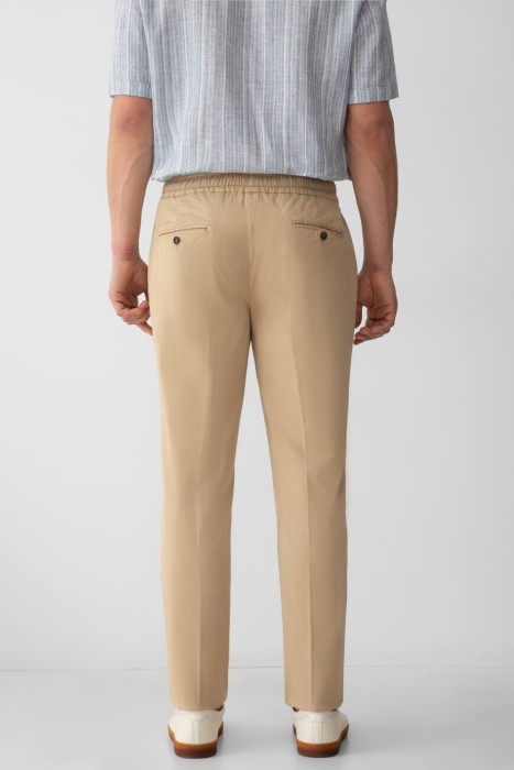 брюки  по цене 43600 руб вид справа