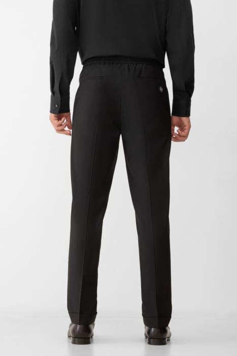 брюки  от бренда philipp plein вид слева