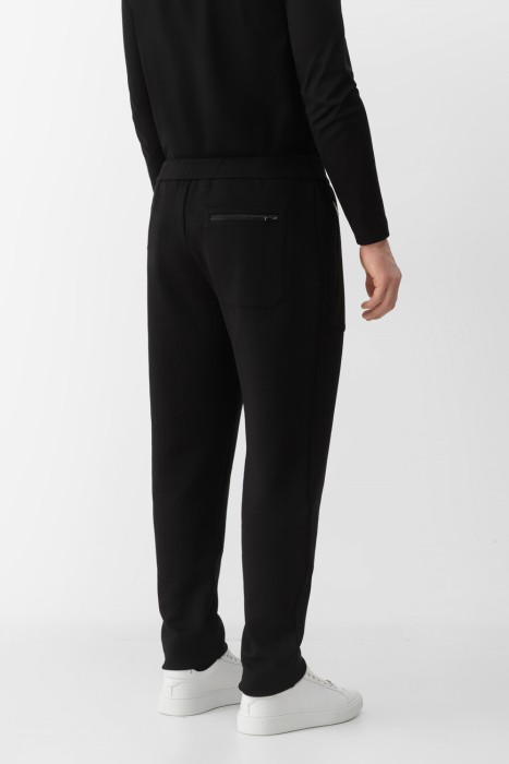 брюки  по цене 54400 руб вид справа