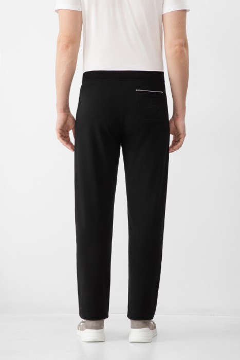 брюки  по цене 52000 руб вид справа