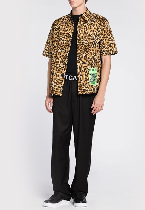 брюки  от бренда just cavalli вид слева