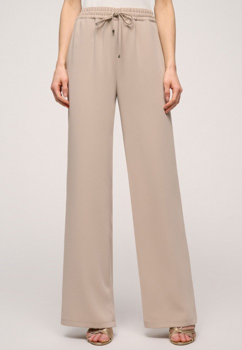 брюки  по цене 20230 руб вид справа