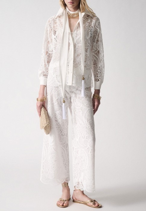 брюки  по цене 34160 руб вид справа