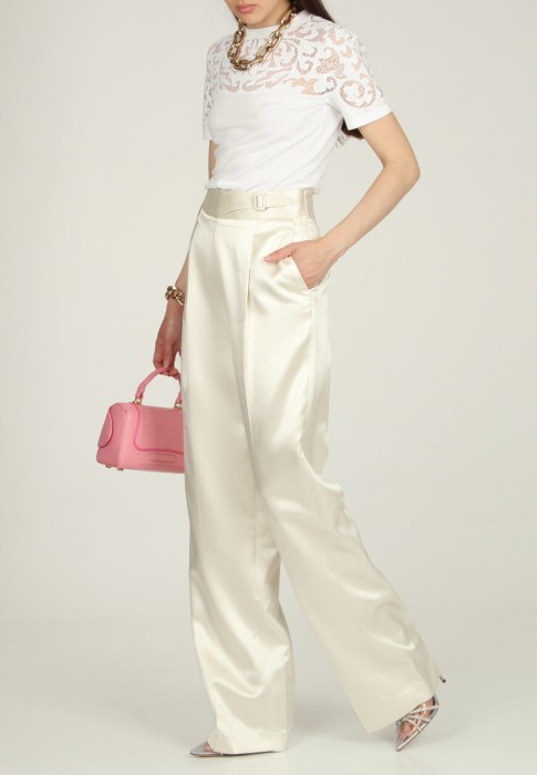 брюки  по цене 102830 руб вид справа