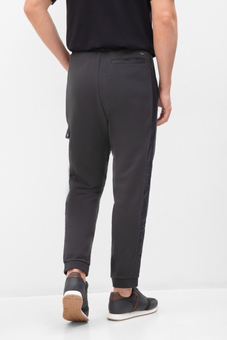 брюки  по цене 50000 руб вид справа