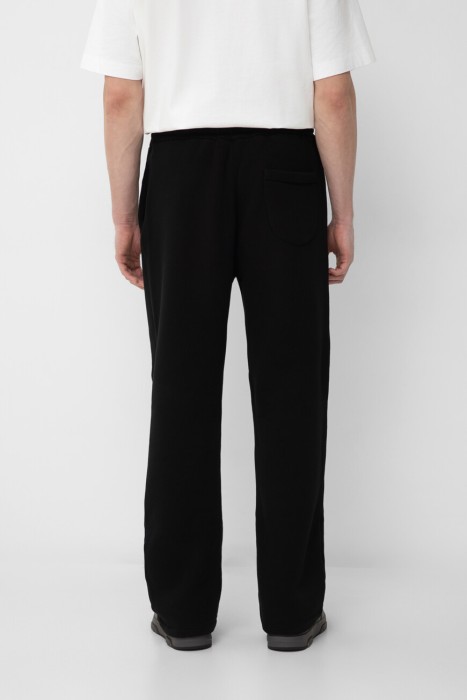 брюки  от бренда off-white вид слева