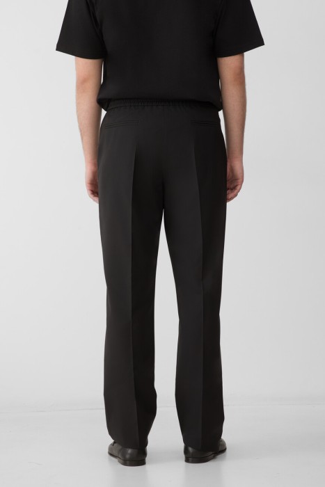 брюки  от бренда valentino вид слева