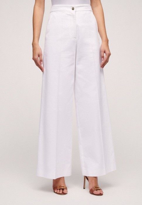 брюки  по цене 35600 руб вид справа