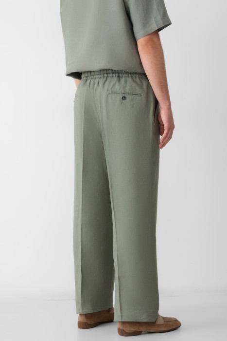 брюки  по цене 117000 руб вид справа