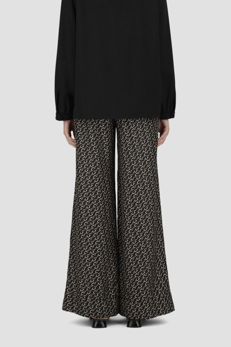 брюки  по цене 77000 руб вид справа