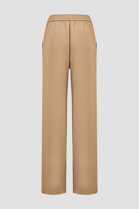 брюки  по цене 44000 руб вид справа