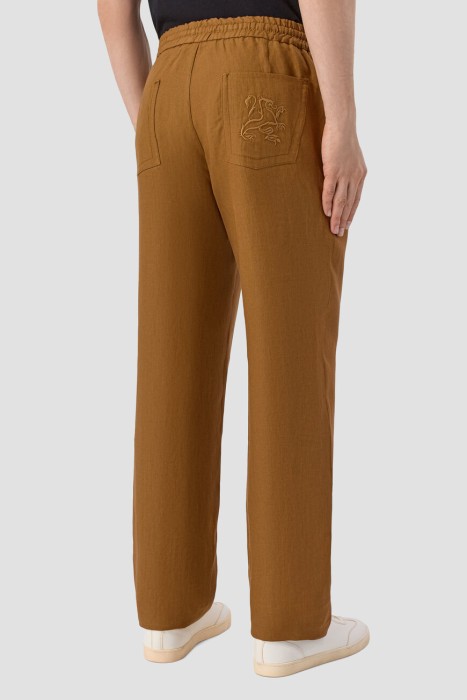 брюки  по цене 150000 руб вид справа