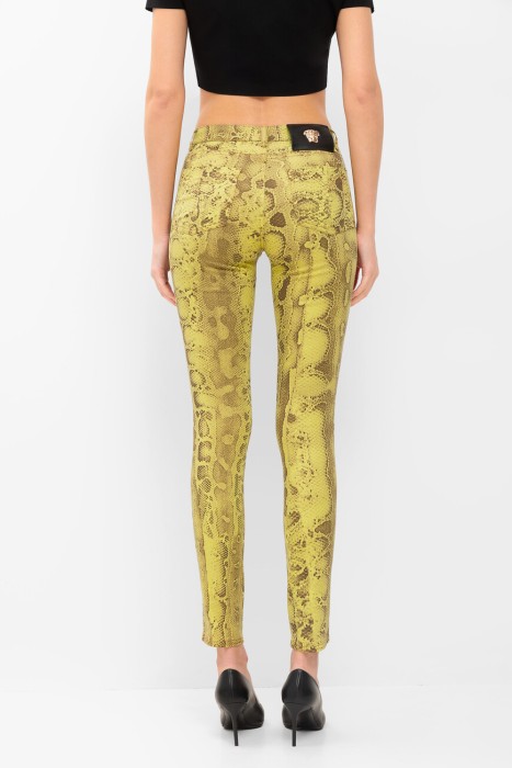 джинсы  от бренда versace вид слева