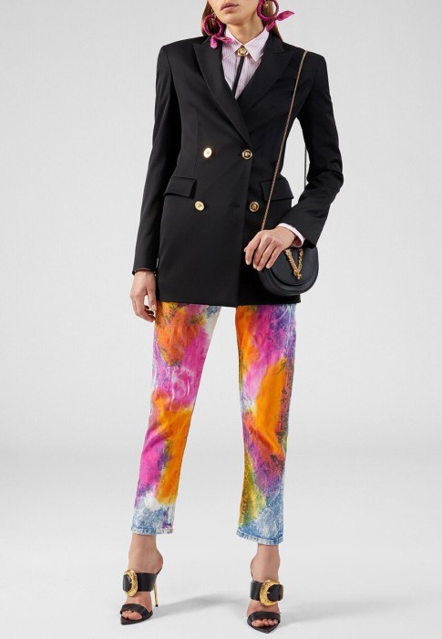 джинсы  от бренда versace вид слева