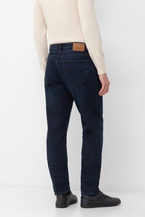 джинсы  по цене 54000 руб вид справа