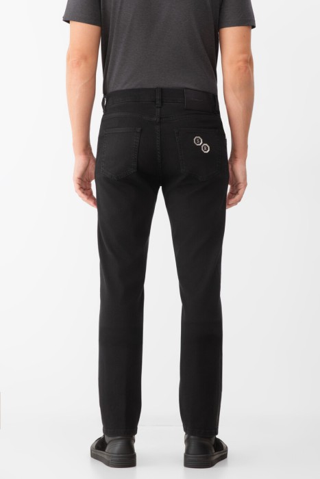 джинсы  от бренда stefano ricci вид слева