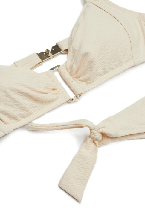 Товар бежевого цвета с внутренней стороны