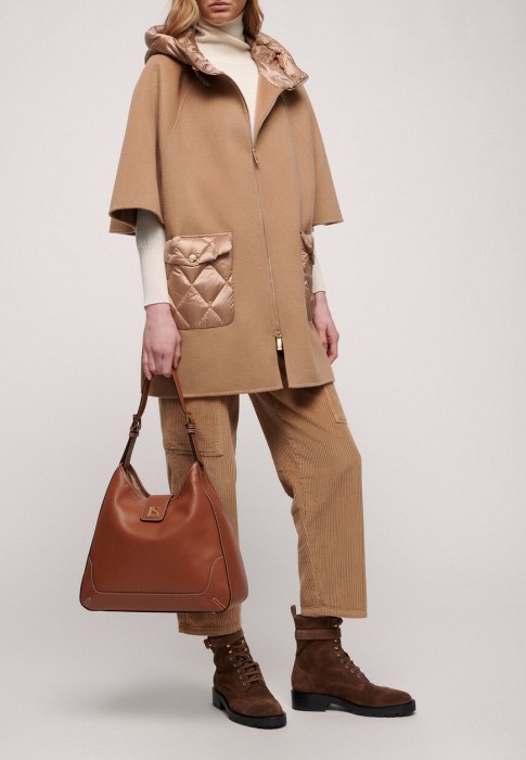 пальто  по цене 58471 руб вид справа