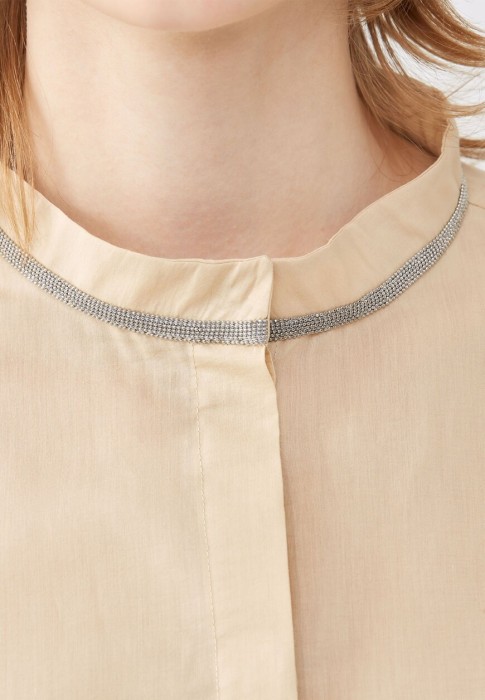 Товар бежевого цвета с внутренней стороны