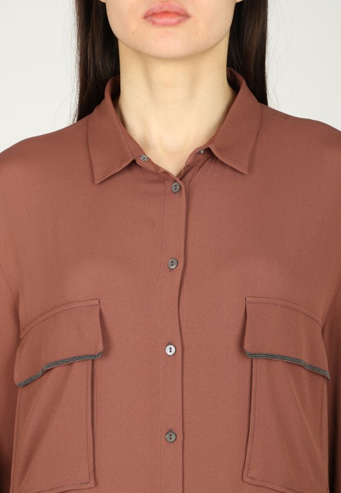 Товар коричневого цвета с внутренней стороны