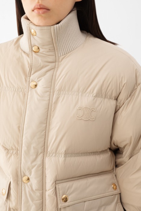 пуховик  из франции вид сбоку