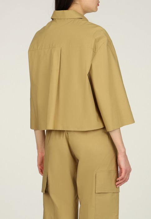 Товар бежевого цвета с внутренней стороны