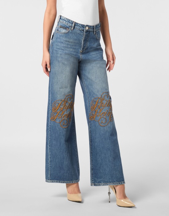 широкие джинсы  от бренда philipp plein вид слева