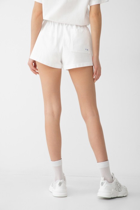 шорты sporty rich модель dodgers serif disco от бренда sporty & rich вид слева