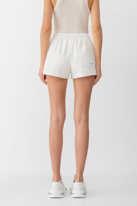 шорты sporty&rich модель homerun disco от бренда sporty & rich вид слева