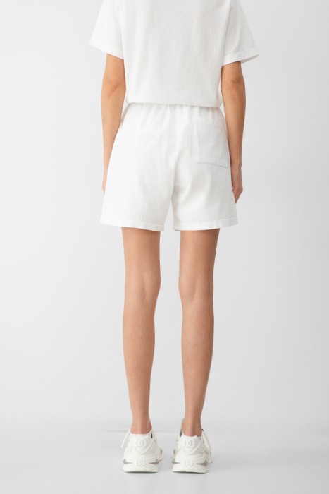 шорты sporty&rich модель ny 94 от бренда sporty & rich вид слева