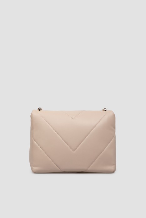 Товар бежевого цвета с внутренней стороны