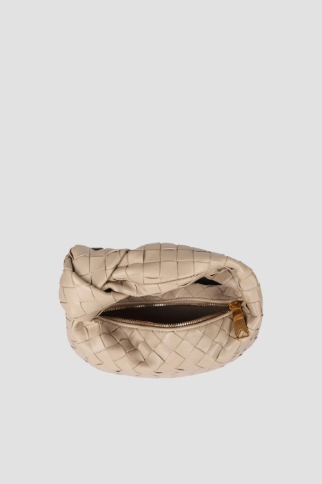 Товар бежевого цвета с внутренней стороны