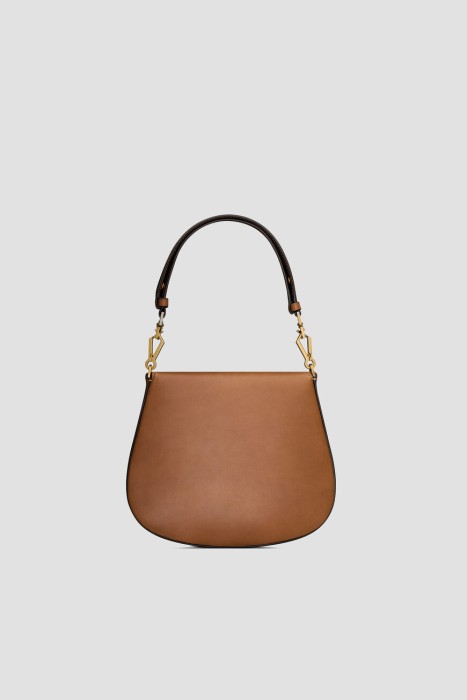 Товар коричневого цвета с внутренней стороны