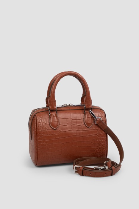 Товар коричневого цвета с внутренней стороны