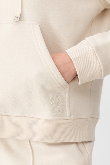 Товар бежевого цвета с внутренней стороны