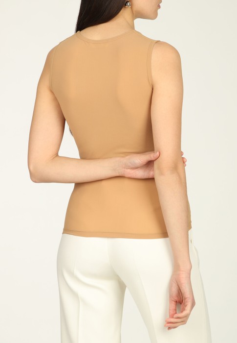 Товар бежевого цвета с внутренней стороны