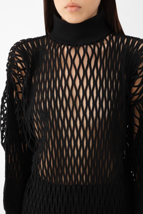 водолазка  модель из эксклюзивной коллекции из франции вид сбоку