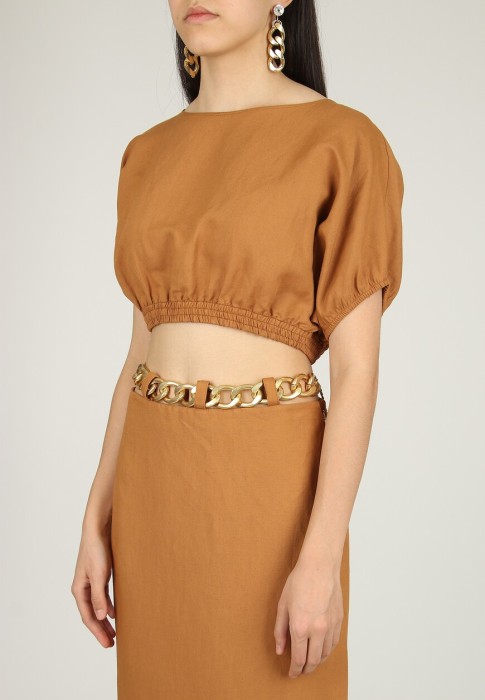 Товар коричневого цвета с внутренней стороны