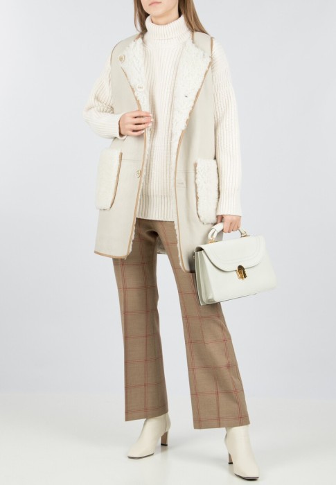 жилет  по цене 196910 руб вид справа