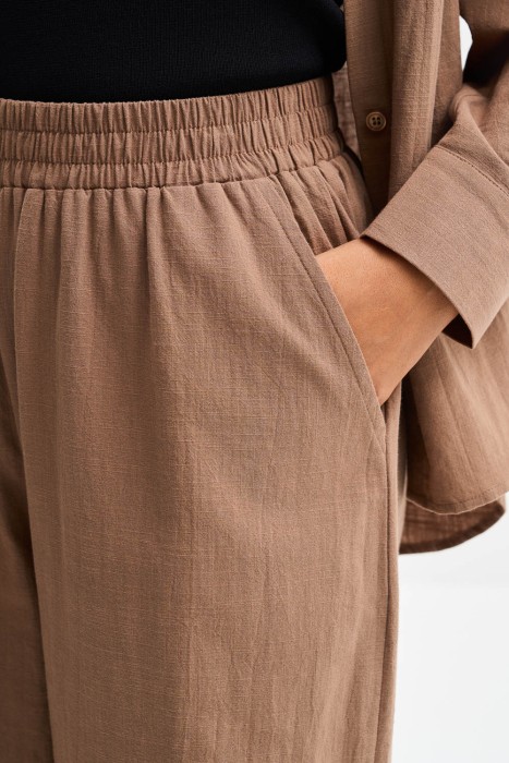 брюки из хлопка из россии вид сбоку