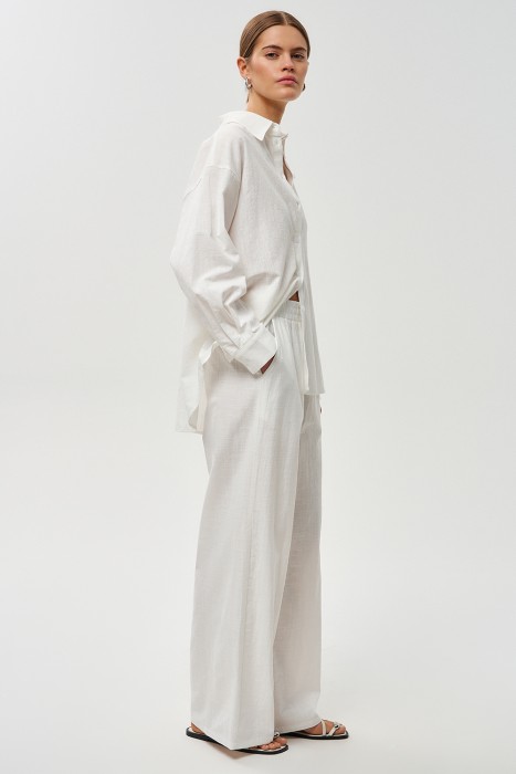 брюки из хлопка из россии вид сбоку