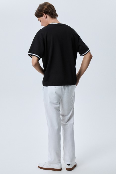 брюки из хлопка по цене 3010 руб вид справа