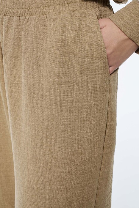 брюки из вискозы и льна из россии вид сбоку