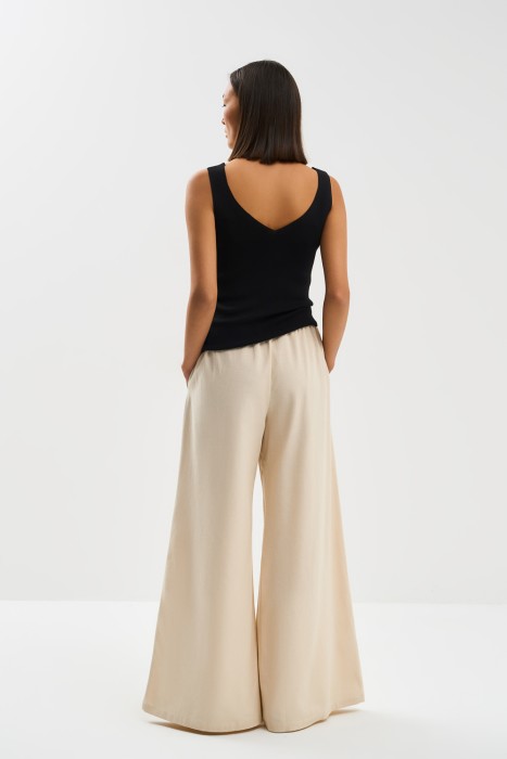 брюки-клеш по цене 1580 руб вид справа