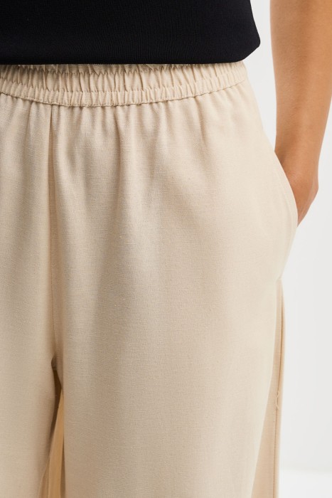 брюки-клеш из россии вид сбоку