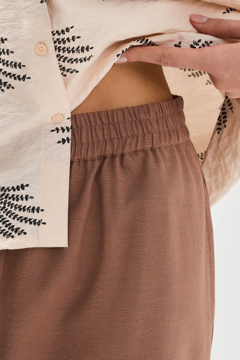 брюки-клеш от бренда снежная королева вид слева